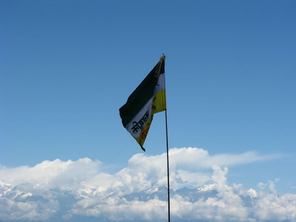 Darjeeling flag with Himalayas in the background