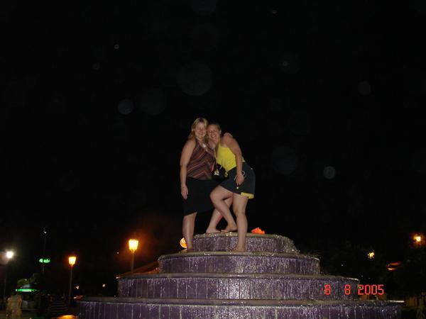 Drunk on top of a fountain