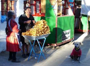 Food stall and dog in Parque Bolivar, Sucre