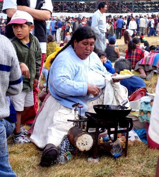 Woman cooking at Sacsayhuaman