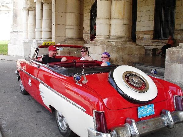 Old Mercury '55 taxi outside Museo de la Revolucion