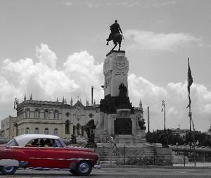 Old car and statue