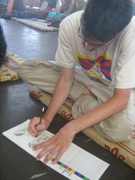 James, drawing Tibetan monks