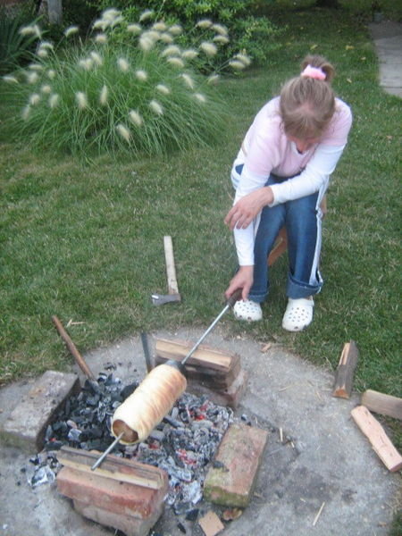My sister in Law slaving over the charcoal
