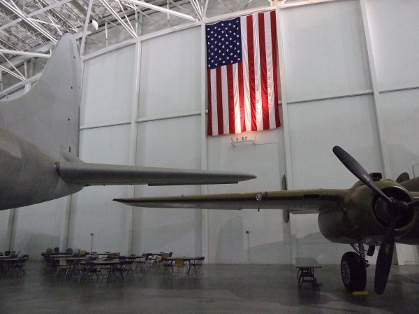 This is the wing of the B-25 next to the TAIL of the B-36.