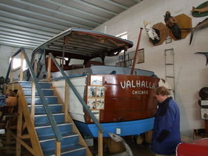 Onaxthiel stands with Warp's yacht Valhalla.  It sank a U-boat.