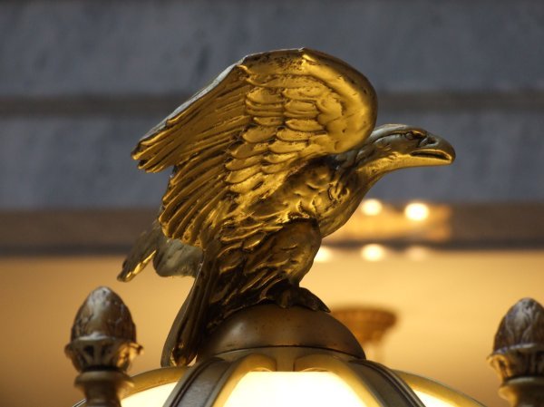 Eagle atop lamp.