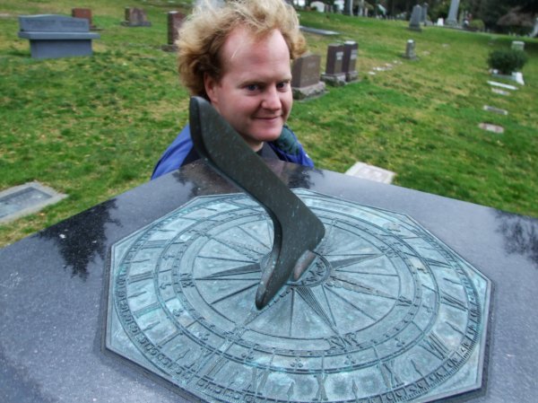 Crazy Onaxthiel at a Sun-dial in the cemetery.