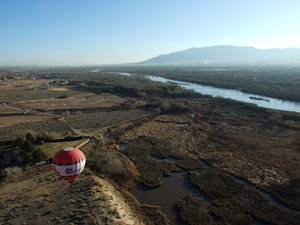 Above the red balloon, looking down on Albuquerque.