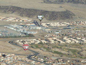 The other two balloons continue over Albuquerque.