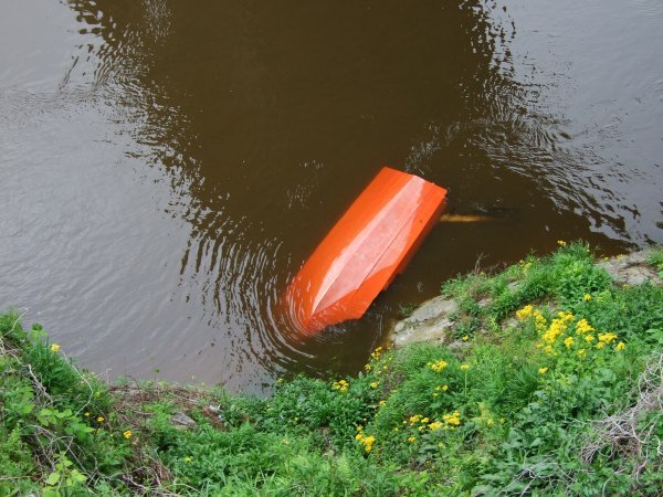 Selma had an overturned and heavily damaged rowboat in the river.