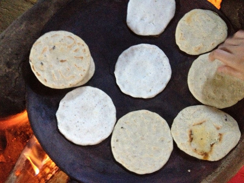 Making Tortillas over the fire