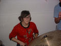 Dennie plays drums