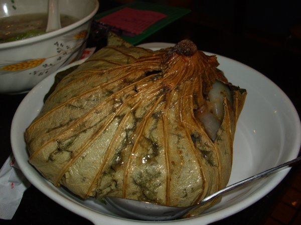 lunch in shenzhen..some kind of leaf stuffed with rice and vegetables