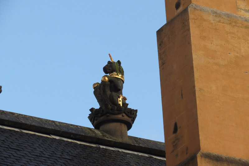 The unicorn atop the castle roofs