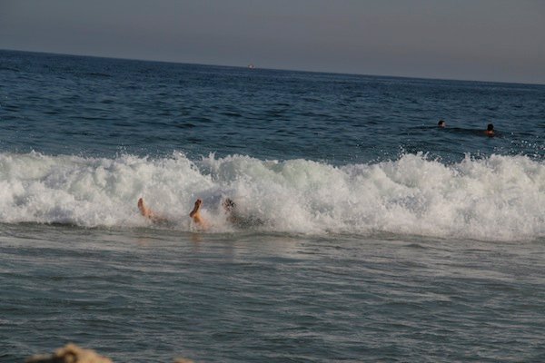 Vanessa gets eaten by a wave!