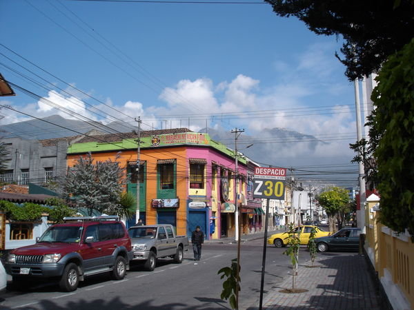 Street in Mariscal with Pichincha in background