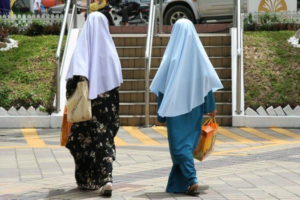 Muslim ladies walking home after their visit to the Open Day