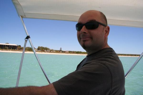 Captain Alan takes to the helm on our own personal glass bottom boat.