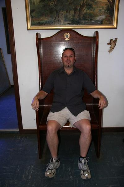Alan, in regal pose on Prince Leonard's throne