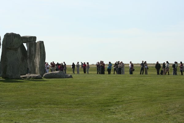 Big henges and little teeny tiny folk looking at them.