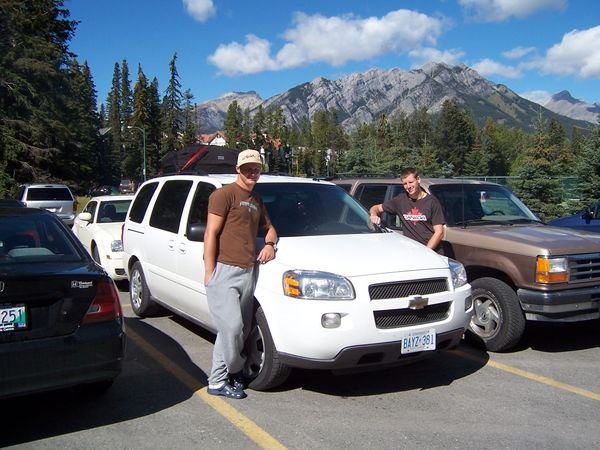 Posing by the car at Banff Springs hotel !