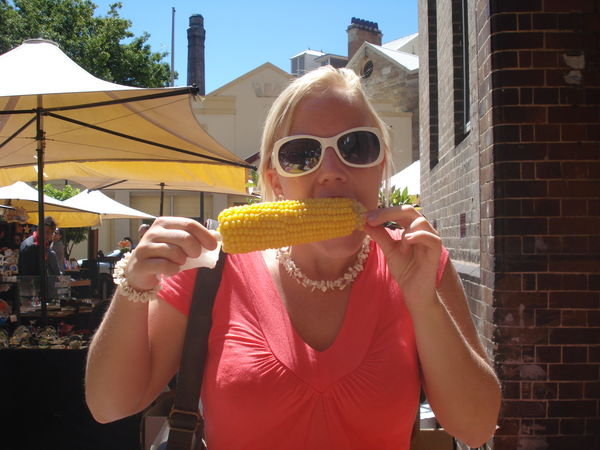 han enjoying her corn in the sunshine..