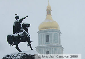 The statue to Bohdan Khmelnytskiy and the spire of St. Sophia's cathedral.