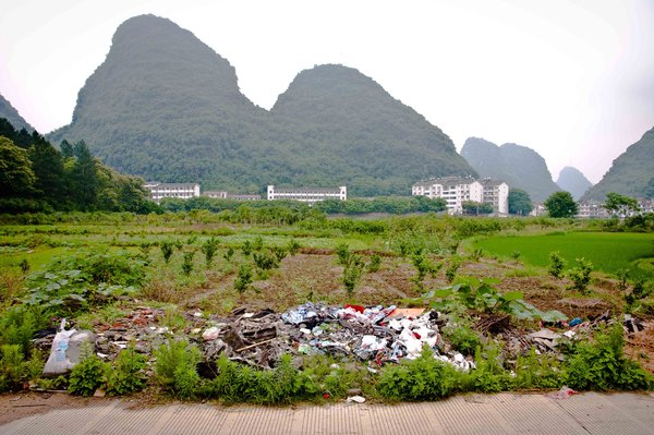 Yangshuo - apartment buildings with rubbish 
