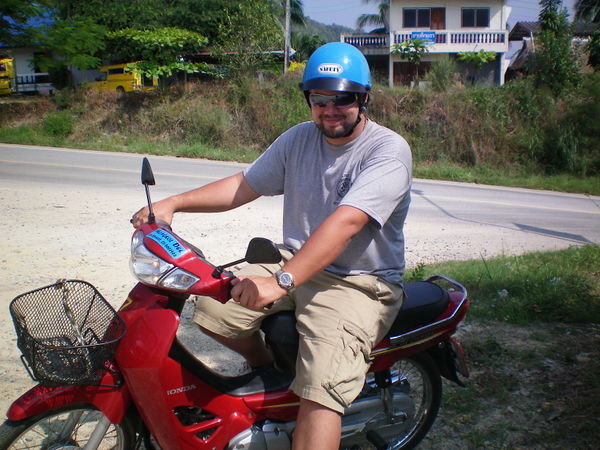 ... Alex zooming around on our rental!!