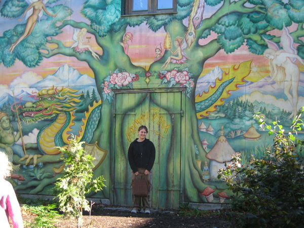 In front of the Mural outside of Christiania