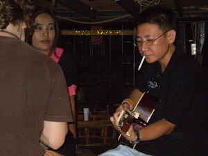 Yun playing guitar