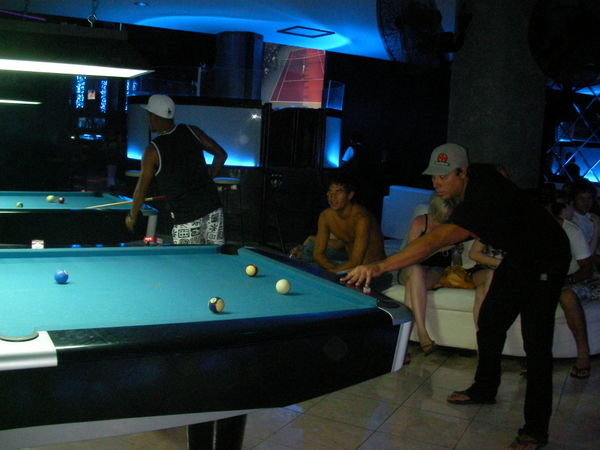 rob playing pool