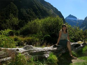 Aoife sitting pretty on a log