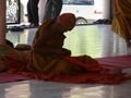 monk, doing his mending