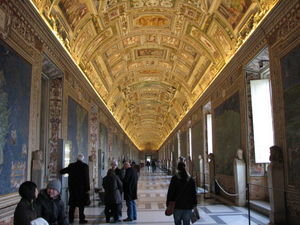 Hallway in Vatican museum. Ceiling full of amazing paintings.