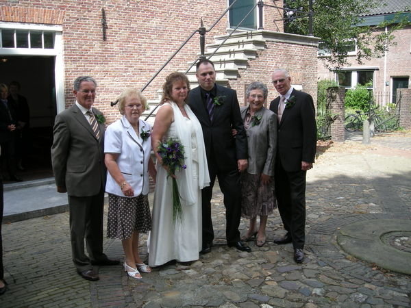 The couple with their parents.