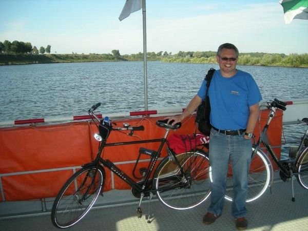 Peter taking the bicycle-punt across the river Maas