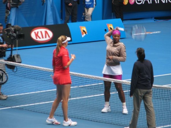 Serena striking a pose for the toss....