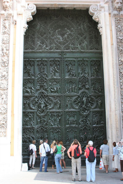 The massive bronze doors.