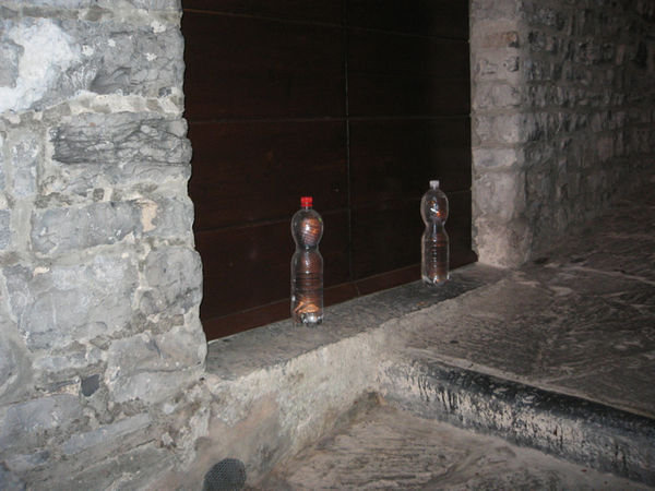 Water bottles appear on all the doors in Varenna...