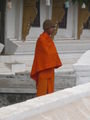 A local monk in Luang Prabang trying to keep warm