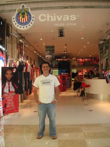 Tomás in front of the Chivas store