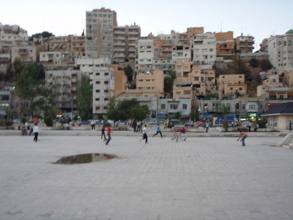 kids playing soccer in amman