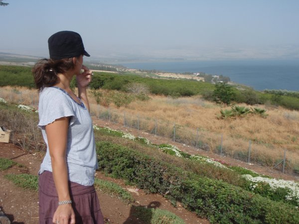 kim eating grapes looking at the sea of galilee from the mt. beatitudes