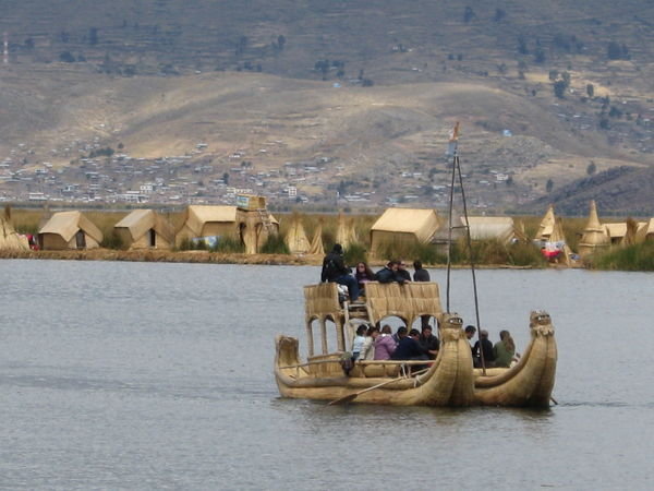 A reed boat by a reed island