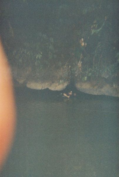 Dom emerging from the cave river