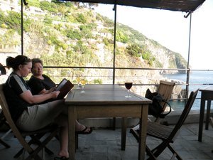 Welcome to the Cinque Terre - perusing the wine menu at Riomaggiore