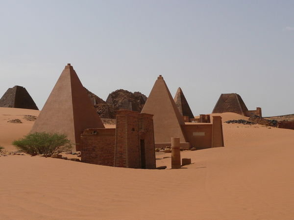 Mix of reconstructed pyramids and the ancient crumbling ones