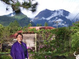 Eloisa's mom by her house in Volcan